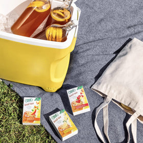 True Lemon Peach Iced Tea carton stacked on shelf communicates value