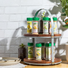 True Lemon spice shaker dispensing action for mess-free seasoning.