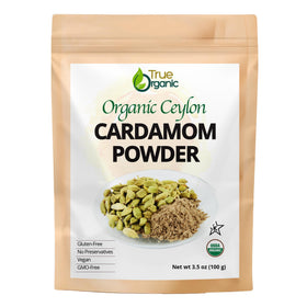 True Organic Cardamom Powder in a paper bag front, premium aroma for baking and cooking.