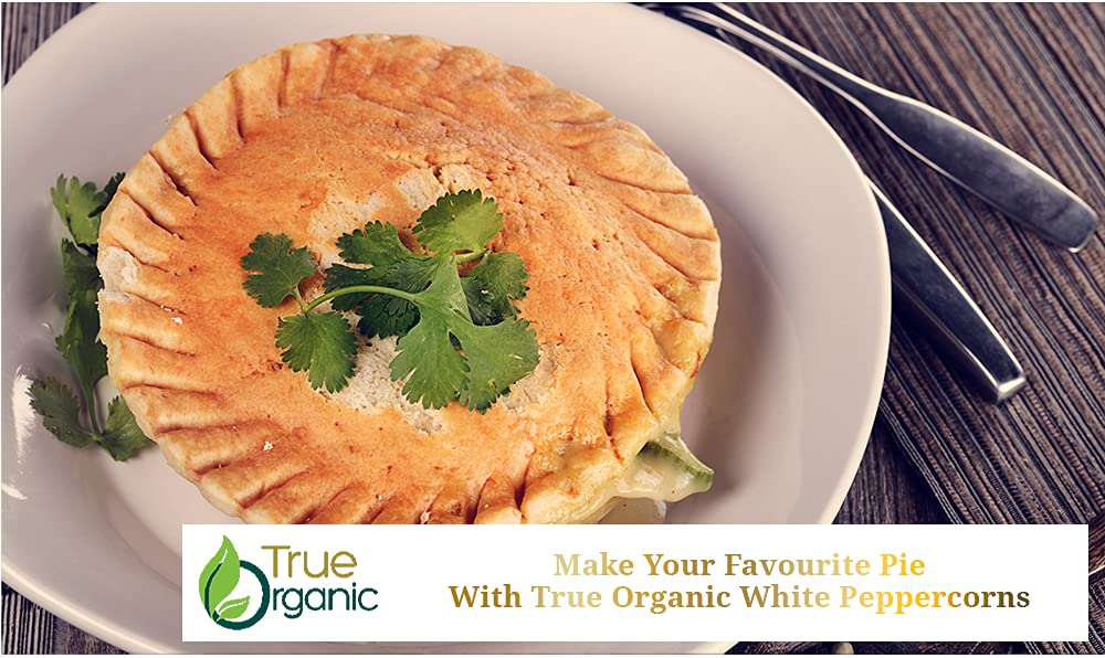 True Organic White Pepper Powder pour shot shows easy sprinkling.