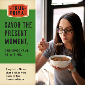 True Primal Beef & Mushroom Soup open can with bowl, ready for quick heating.
