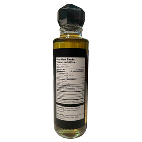 Popcorn tossed with TRUFF Black Truffle Oil for gourmet snack.