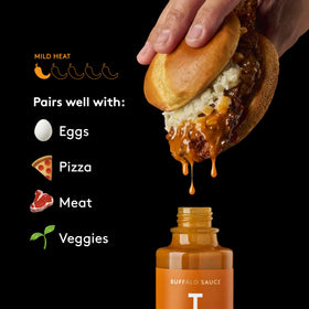 TRUFF Buffalo Sauce with wings: perfect buffalo glaze for bold, restaurant-worthy wing nights.