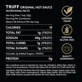 TRUFF bottle pouring scene suggests easy, versatile flavor boost for meals.