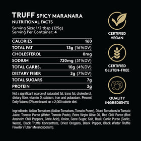 Close-up of TRUFF ingredients—tomatoes, herbs, and black truffle—fresh and premium.