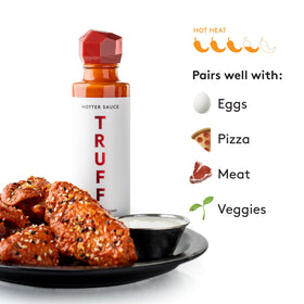 TRUFF White Hotter ingredients closeup, featuring white truffles and agave nectar.