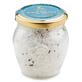 TruffleHunter black truffle cornish sea salt flakes close-up on jar, ideal finishing touch for dishes.