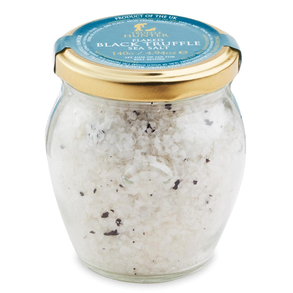 TruffleHunter black truffle cornish sea salt flakes close-up on jar, ideal finishing touch for dishes.