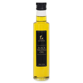 TruffleHunter black truffle oil bottle, premium flavor for finishing dishes.