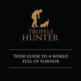 TruffleHunter white truffle honey on table invites tasting.