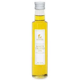 TruffleHunter white truffle oil bottle pour with earthy aroma.