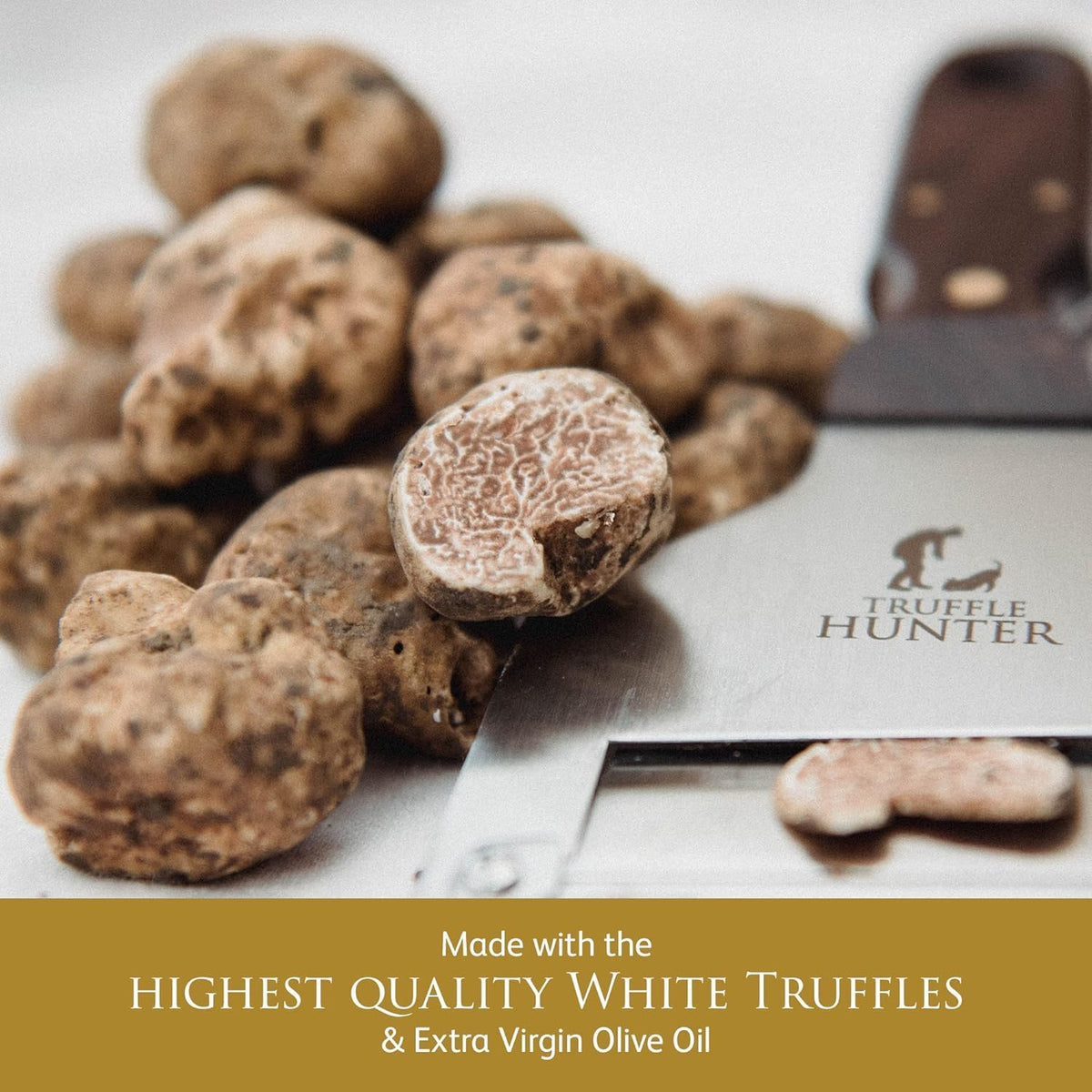 Closeup of TruffleHunter label on white truffle oil bottle.