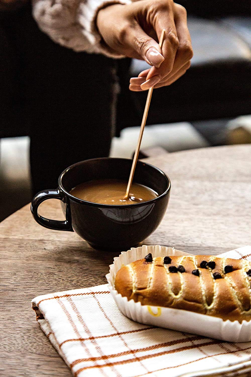 Stacked G7 3-in-1 coffee packets in a bag for travel convenience.