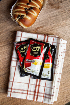 Trung Nguyen G7 nondairy creamer packets for creamy, low-sugar coffee.