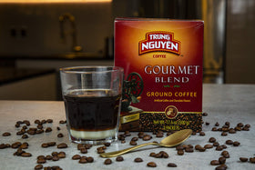Trung Nguyen Gourmet Blend cup closeup shows deep color and chocolate hints.