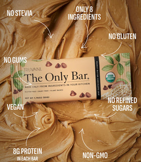 Truvani bar wrapper opened showing a dairy-free, protein-packed snack.