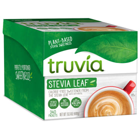 Truvia Original calorie-free stevia packets beside coffee for sugar-free sweetness