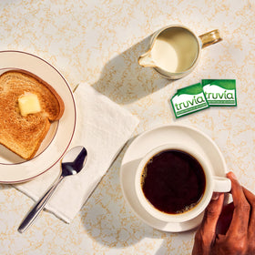 Truvia packet with a refreshing glass of iced tea