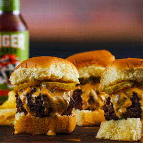 Try Me Tiger Sauce on meat demonstrates bold seasoning with a hint of sweetness.
