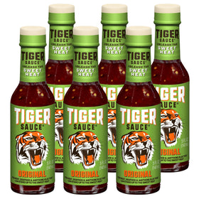 Try Me Tiger Sauce Original bottle 5oz enhances meats with balanced sweet-spicy flavor.