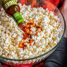 Try Me Tiger Sauce Original grill scene hints zesty heat on meats.