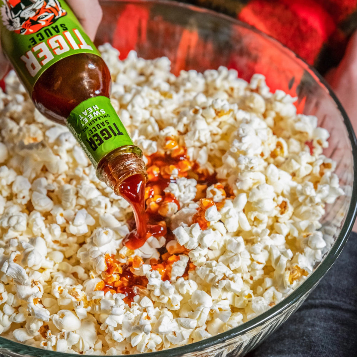 Pour action of Try Me Tiger Sauce Original adds balanced heat to dishes.
