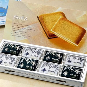 Shiroi Koibito white chocolate cookies close-up, creamy milk flavor and delicate texture.