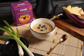 Tsubi Soup eggplant-ginger close-up with visible vegetables.
