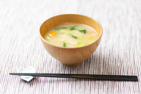 Tsubi Soup gluten-free and vegan label signaling safe, dairy-free miso bowls.