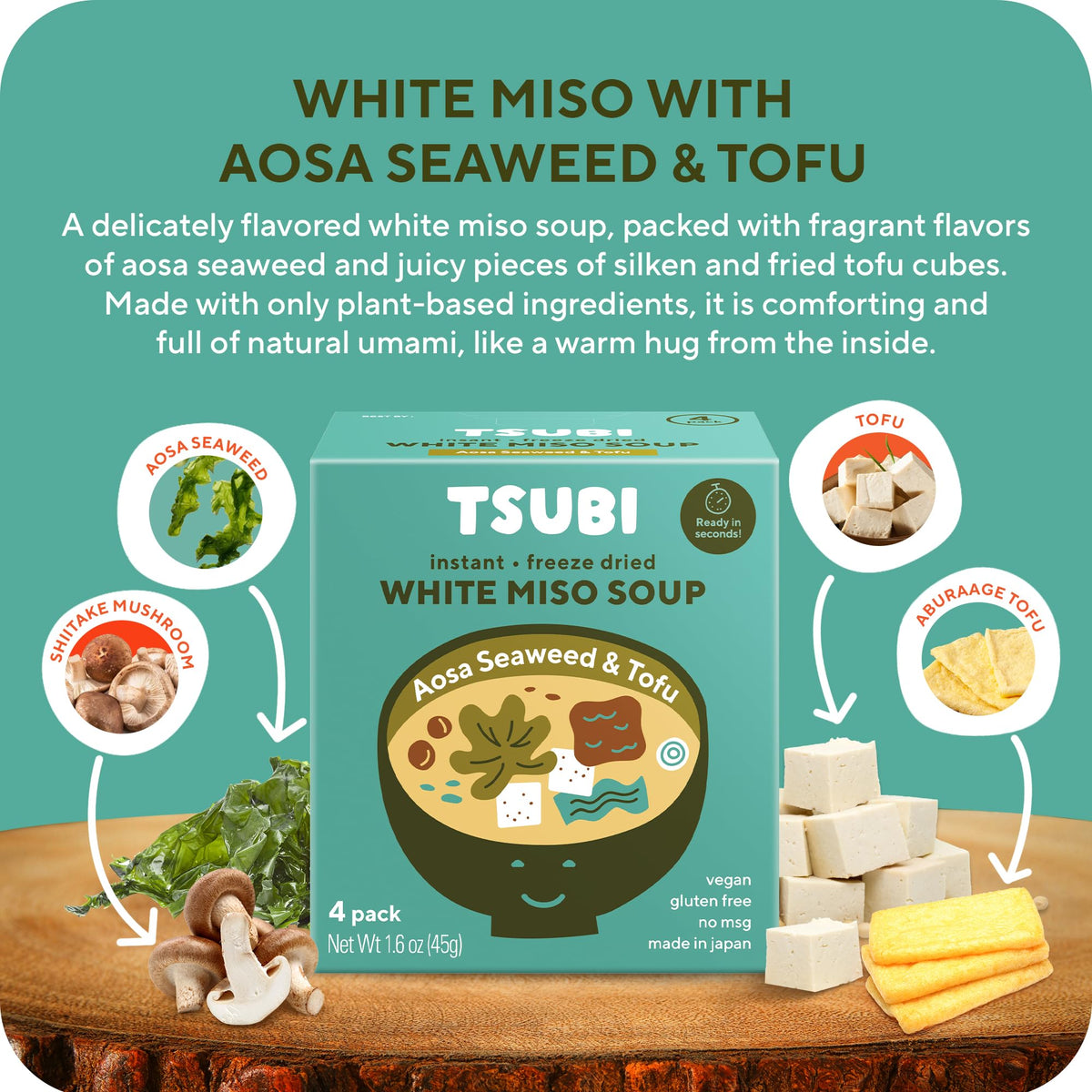 Tsubi Soup white miso with tofu and aosa seaweed in broth.