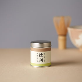 TSUJIRI Decaf Matcha cup with steam signaling a gentle experience