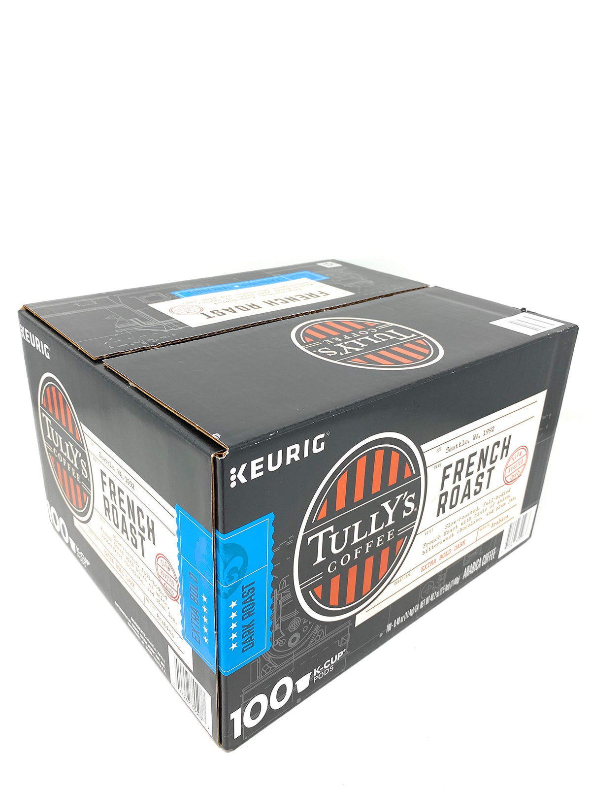 Close-up of a single Tully's French Roast K-Cup pod ready for brewing.