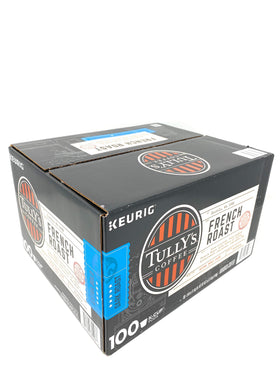 Close-up of a single Tully's French Roast K-Cup pod ready for brewing.