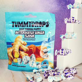 Tummydrops lozenges on a table showing on-the-go use