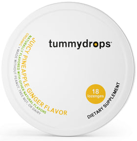 TummyDrops Mellow Ginger drops in glass, showing smooth texture