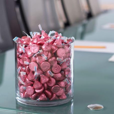 Close-up of Hershe.ysKISSES pink foil milk chocolate kisses for festive display.