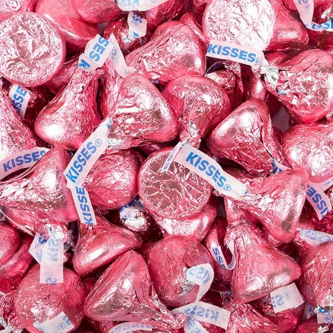 Tundras Hershe.ysKISSES milk chocolate kisses in pink foil, ideal for party favors and gifting.