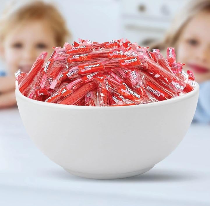 Tundras Twizlers Pull 'n' Peel serving bowl highlights colorful candy for gatherings.