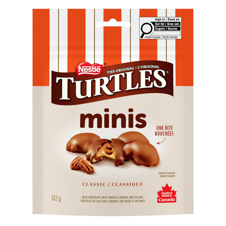 Turtles Mini Original pieces close-up show chocolate caramel pecan texture for indulgent snacking.