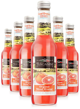 Tuscanini Blood Orange Soda bottle pouring over ice, highlighting real juice and bright aroma.