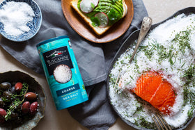 Dissolving Tuscanini salt for a relaxing spa-like bath at home.