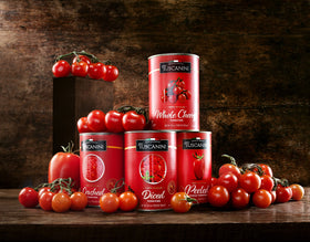 Tuscanini Crushed Tomatoes 4-pack can close-up; BPA-free packaging supports safe flavor preservation.