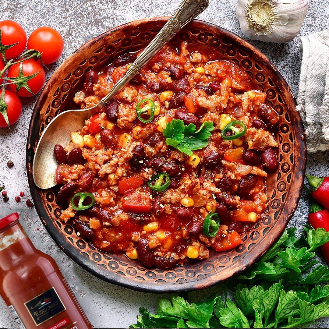 Tuscanini crushed tomatoes on pantry shelf imported from Italy