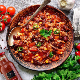 Tuscanini crushed tomatoes on pantry shelf imported from Italy