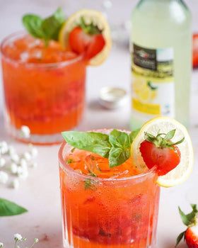 Tuscanini Organic Sparkling Lemon glass being poured, highlighting real juice and sparkle.
