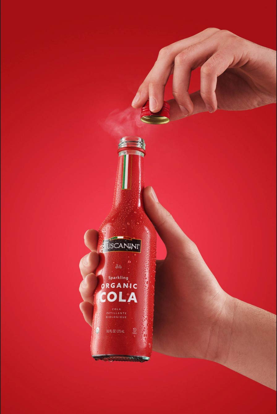 Tuscanini Organic Cola six-pack, ideal for family gatherings and shared drinks.