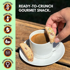 Tutti Gourmet pistachio cranberry biscotti dunking with coffee