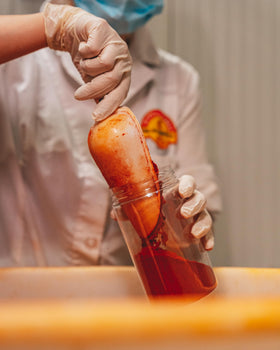 TUTTOCALABRIA Calabrian chili powder poured from the shaker, perfect on pizzas and antipasti