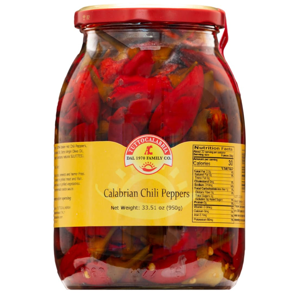 TUTTOCALABRIA chili peppers in oil in a glass jar for authentic Calabrian flavor.