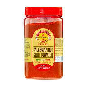 TUTTOCALABRIA chili powder dust over a jar capturing authentic Calabrian flavor.
